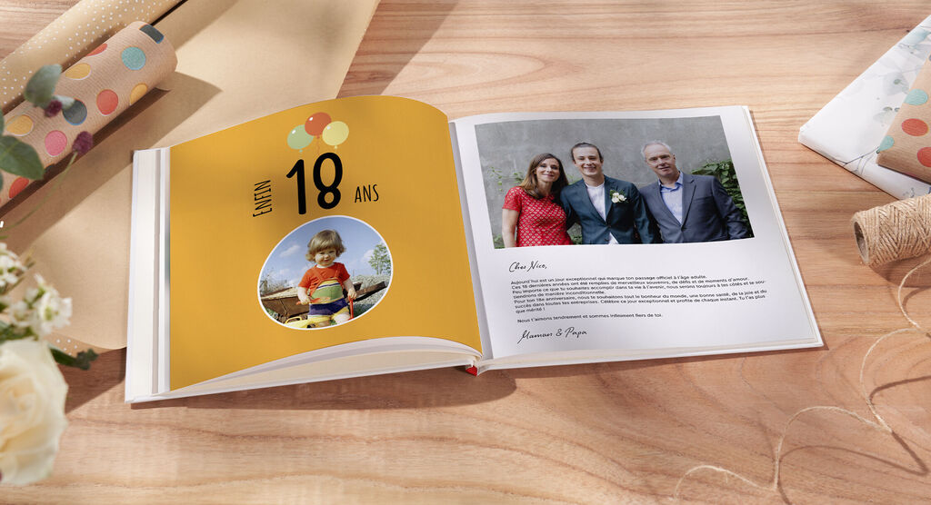 Un CEWE livre photo affectueux pour un 18e anniversaire avec une couverture colorée et des photos personnelles